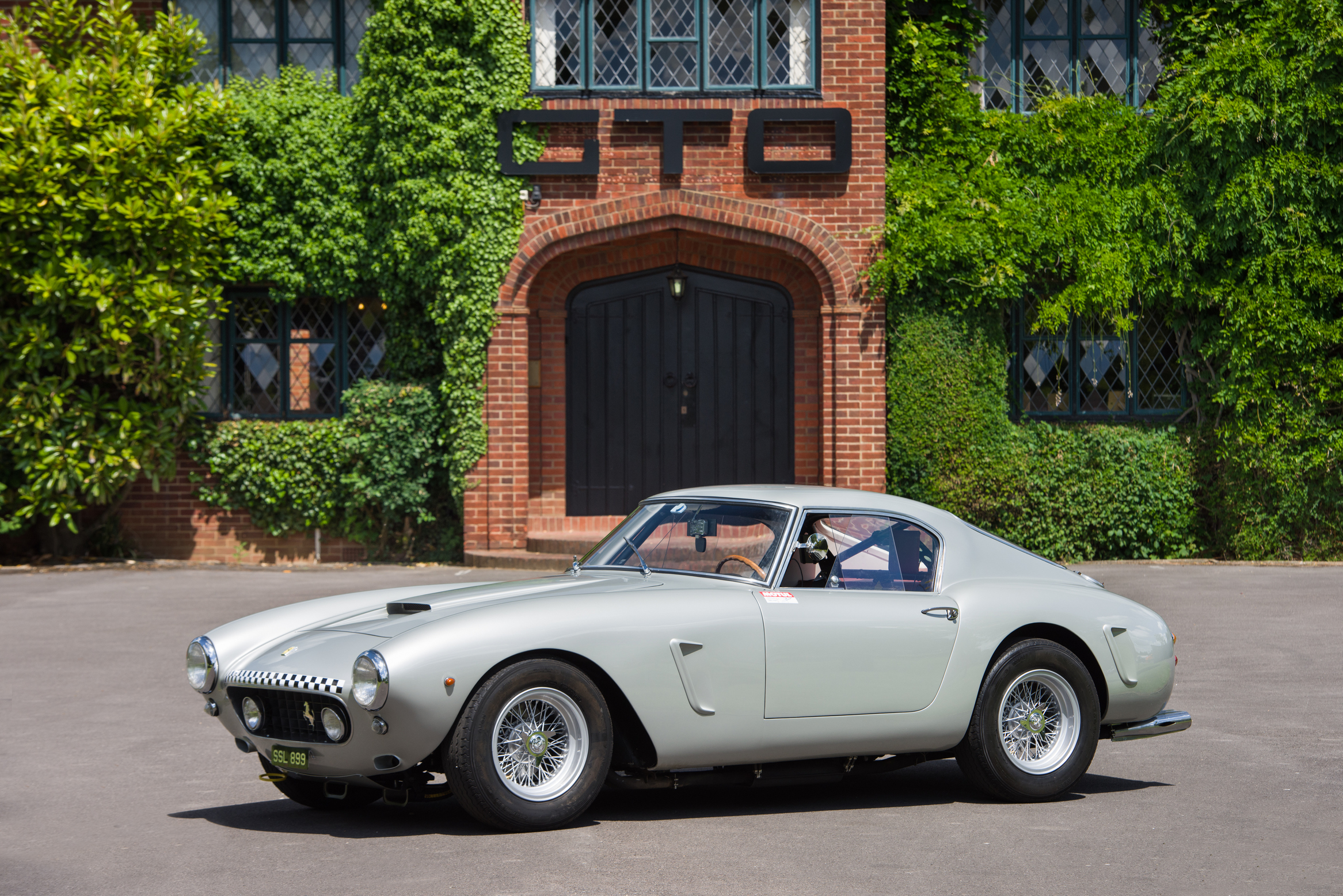 An azzuro 250 GT Berlinetta SWB outside GTO House